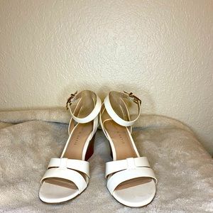 White strappy heeled sandals